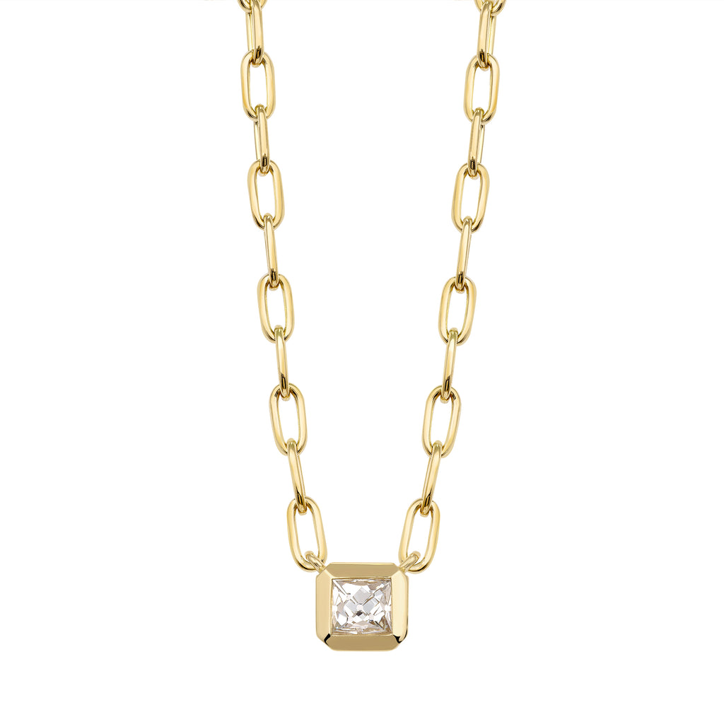 
Single Stone's Karina necklace ring  featuring 0.71ct J/VS2 GIA certified French cut diamond bezel set on our handcrafted 18K yellow gold Bond chain.
Necklace measures 17"
