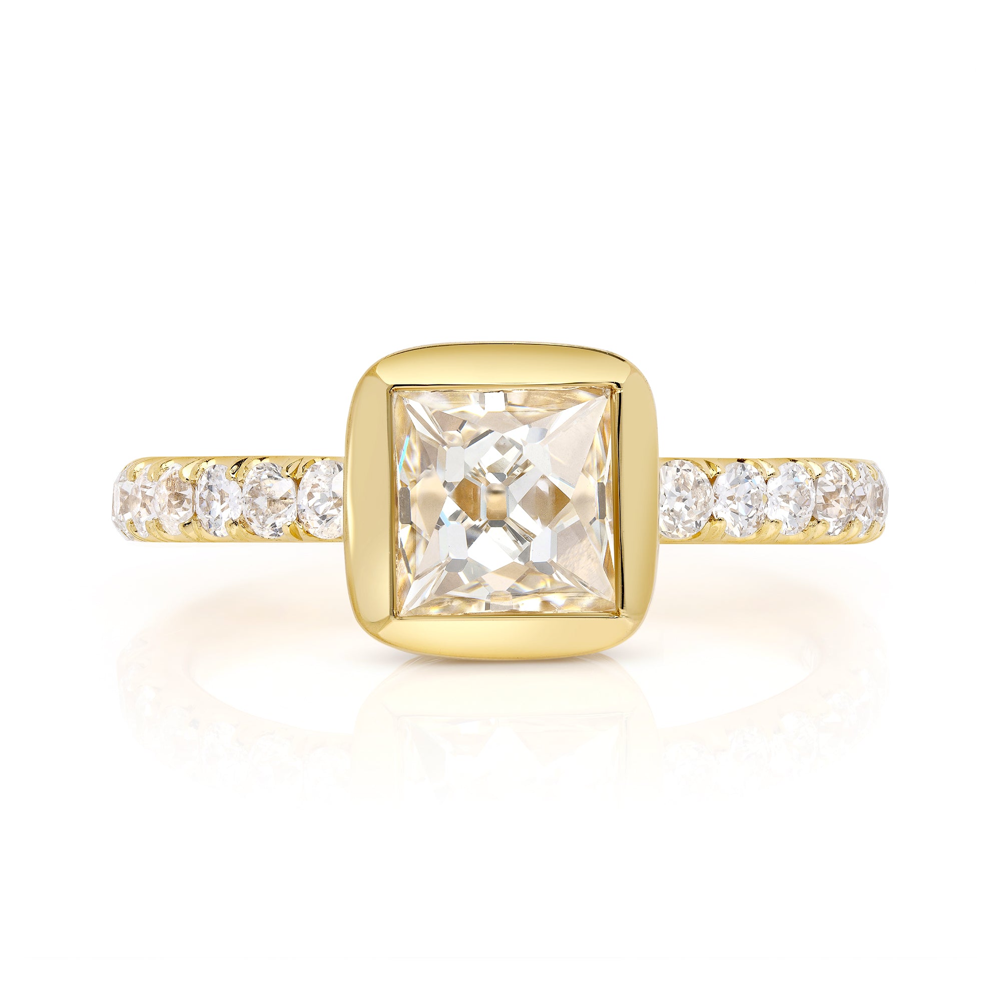 SINGLE STONE KARINA RING featuring 1.39ct J/VS1 GIA certified French cut diamond with 0.43ctw old European cut accent diamonds set in a handcrafted 18K yellow gold mounting.