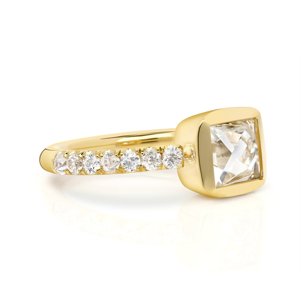 Single Stone's KARINA ring  featuring 1.39ct J/VS1 GIA certified French cut diamond with 0.43ctw old European cut accent diamonds set in a handcrafted 18K yellow gold mounting.  
