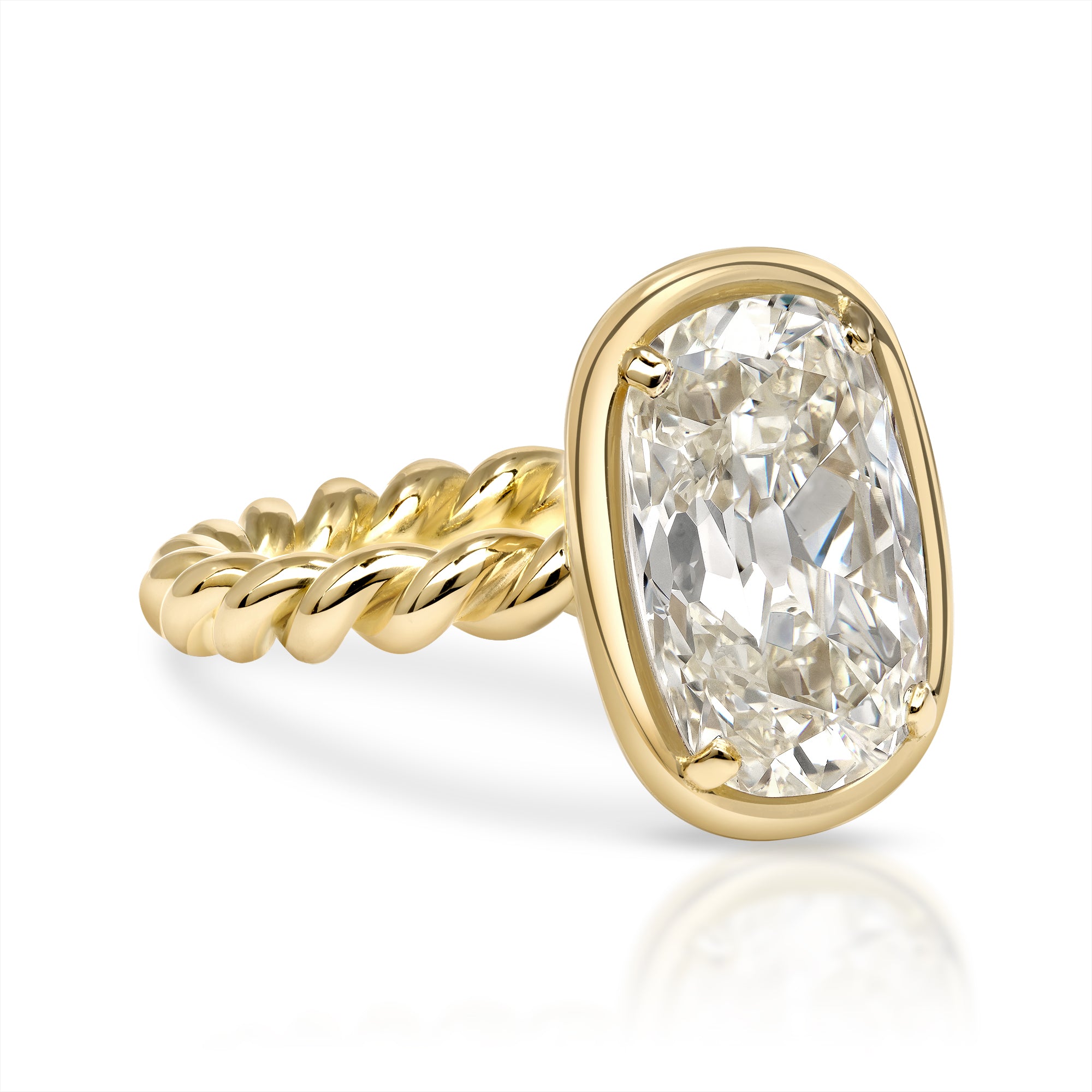 SINGLE STONE LARA RING featuring 5.09ct S-T/VS1 GIA certified antique Cushion cut diamond bezel set in a handcrafted 18K yellow gold mounting.