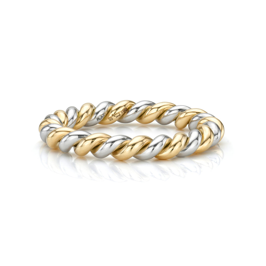 
Single Stone's Large lara, two tone band  featuring Handcrafted twisted 18K yellow gold and platinum band.
