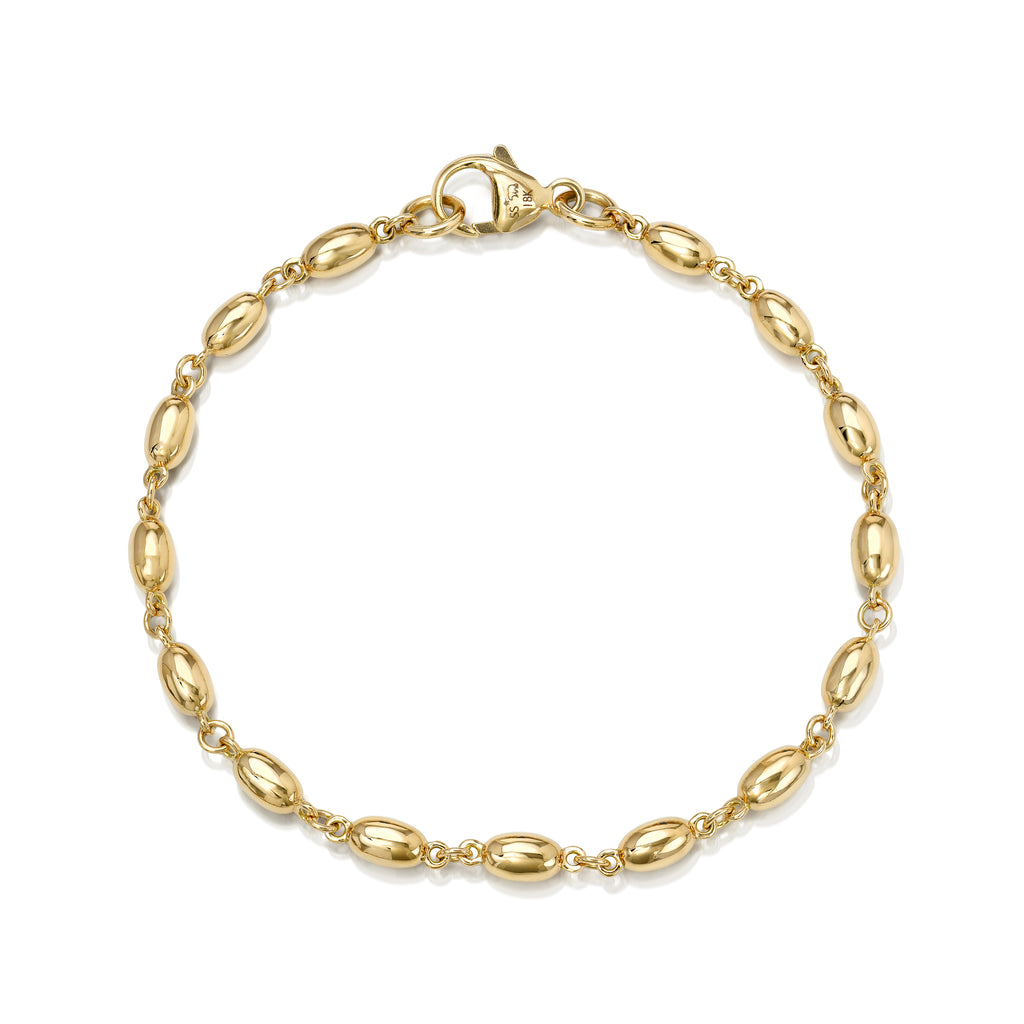 
Single Stone's Large dorothy bracelet  featuring Handcrafted 18K yellow gold long bead bracelet.
Bracelet measures 7.5".
