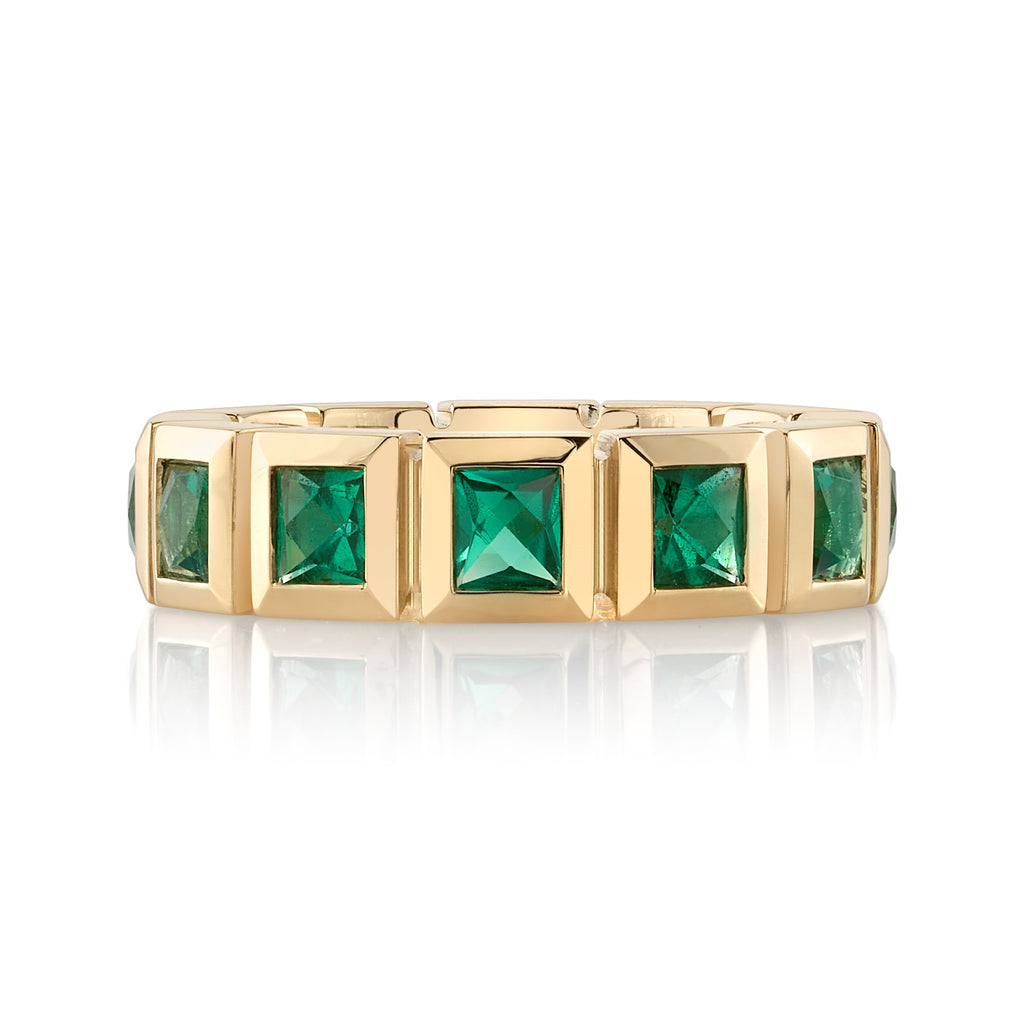 Single Stone's LARGE KARINA WITH GEMSTONES band  featuring Approximately 2.75ctw-3.00ctw square French cut gemstones bezel set in a handcrafted 18K yellow gold eternity band. Available with rubies, sapphires or emeralds. Approximate band width 5.5mm. Please inquire for additional customization.   
