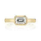 SINGLE STONE LEAH RING featuring 1.04ct K/VS2 GIA certified emerald cut diamond bezel set in a handcrafted 18K yellow gold mounting,