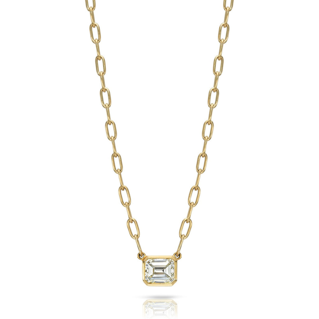 Single Stone's LEAH NECKLACE  featuring 2.23ct L/VS1 GIA certified emerald cut diamond bezel set in a handcrafted 18K yellow gold necklace.
