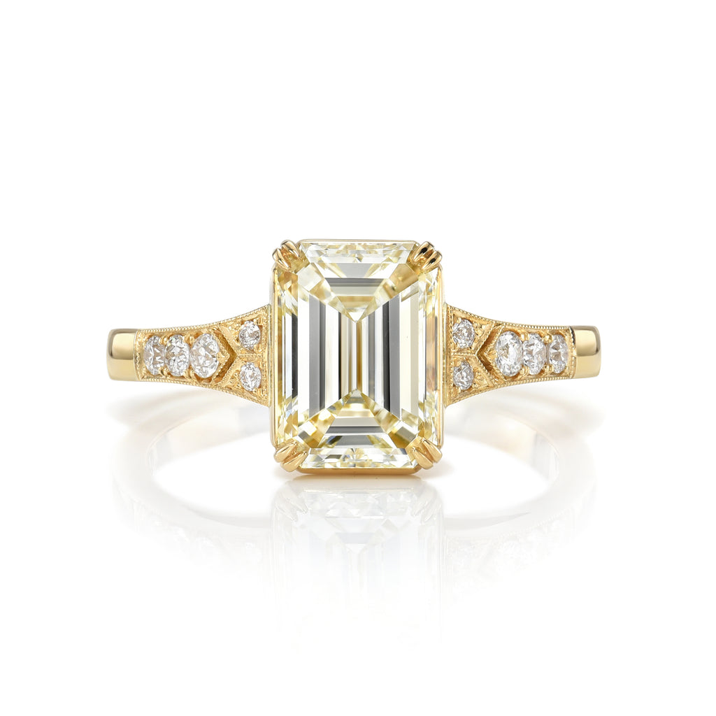 
Single Stone's Lorraine ring  featuring 2.00ct M/VS2 GIA certified emerald cut diamond with 0.10ctw old European cut accent diamonds set in a handcrafted 18K yellow gold mounting.
