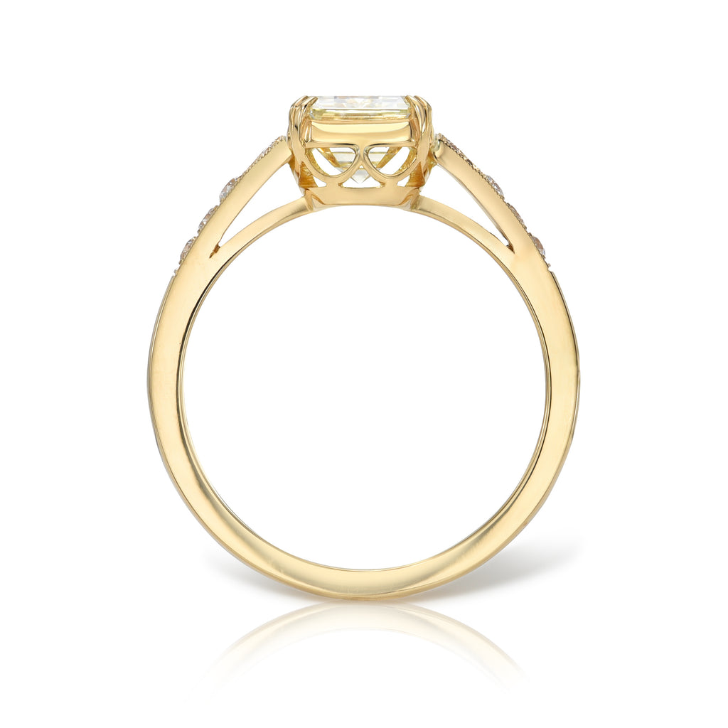 Single Stone's LORRAINE ring  featuring 2.00ct M/VS2 GIA certified emerald cut diamond with 0.10ctw old European cut accent diamonds set in a handcrafted 18K yellow gold mounting.
