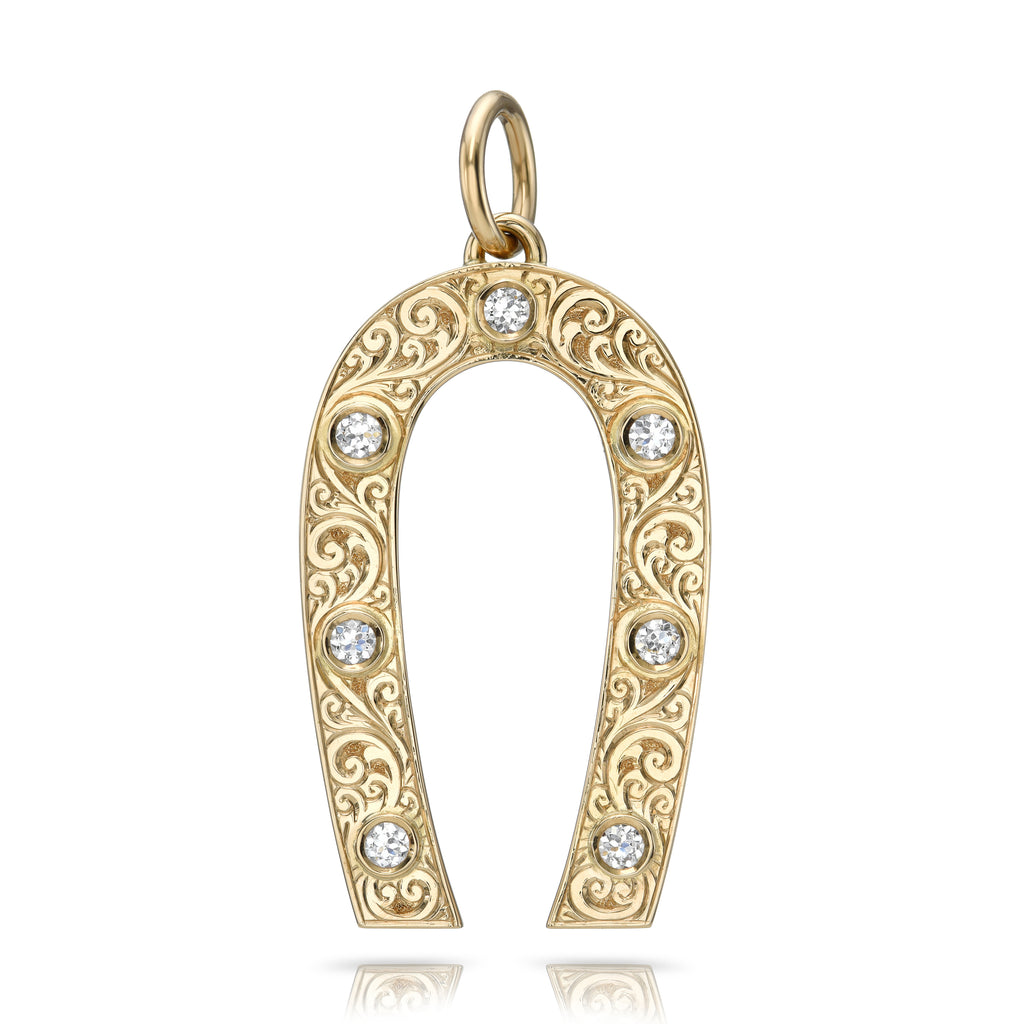 Single Stone's LARGE MARILYN pendant  featuring Approximately 0.70ctw G-H/VS old European cut diamonds bezel set in a handcrafted, hand engraved 18K yellow gold horseshoe pendant.
