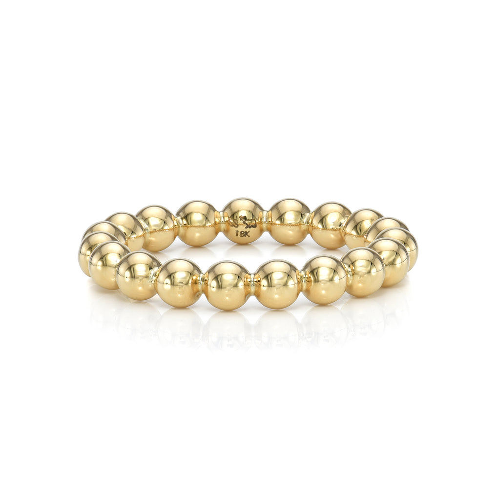 
Single Stone's Medium gaia band  featuring 3.5mm handcrafted high polish 18K yellow gold beaded band.
