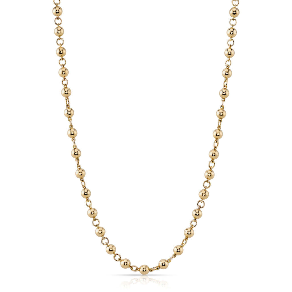 
Single Stone's Mirella necklace  featuring Handcrafted 18K yellow gold large rosary bead necklace. Beads on chain measure 5mm in diameter.
Necklace available in 17" and 19" lengths.
Price does not include charms. 
