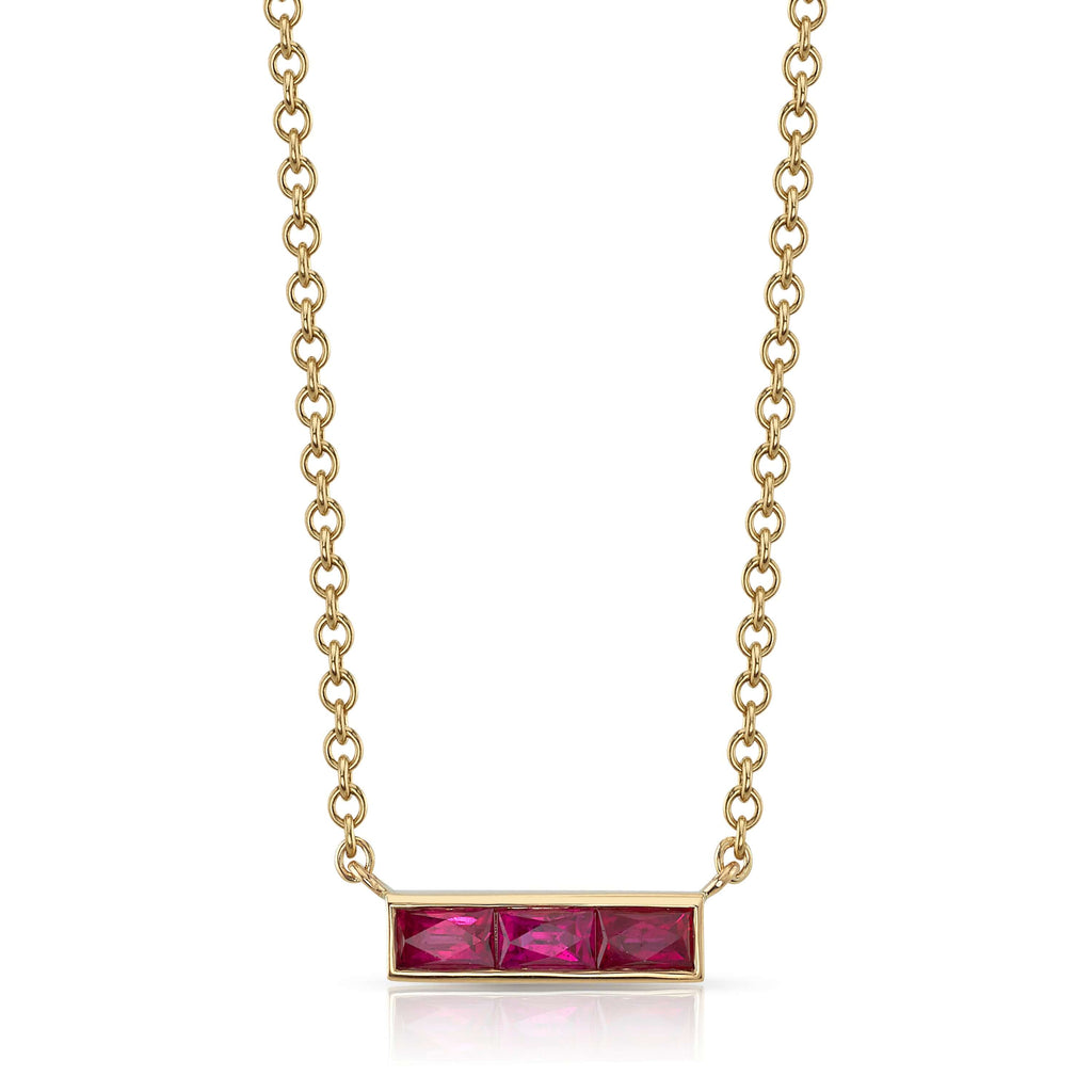 Single Stone's MONET NECKLACE WITH GEMSTONES  featuring Approximately 0.50ctw French cut rubies or sapphires set in a handcrafted bar pendant. Necklace measures 17&quot;.
