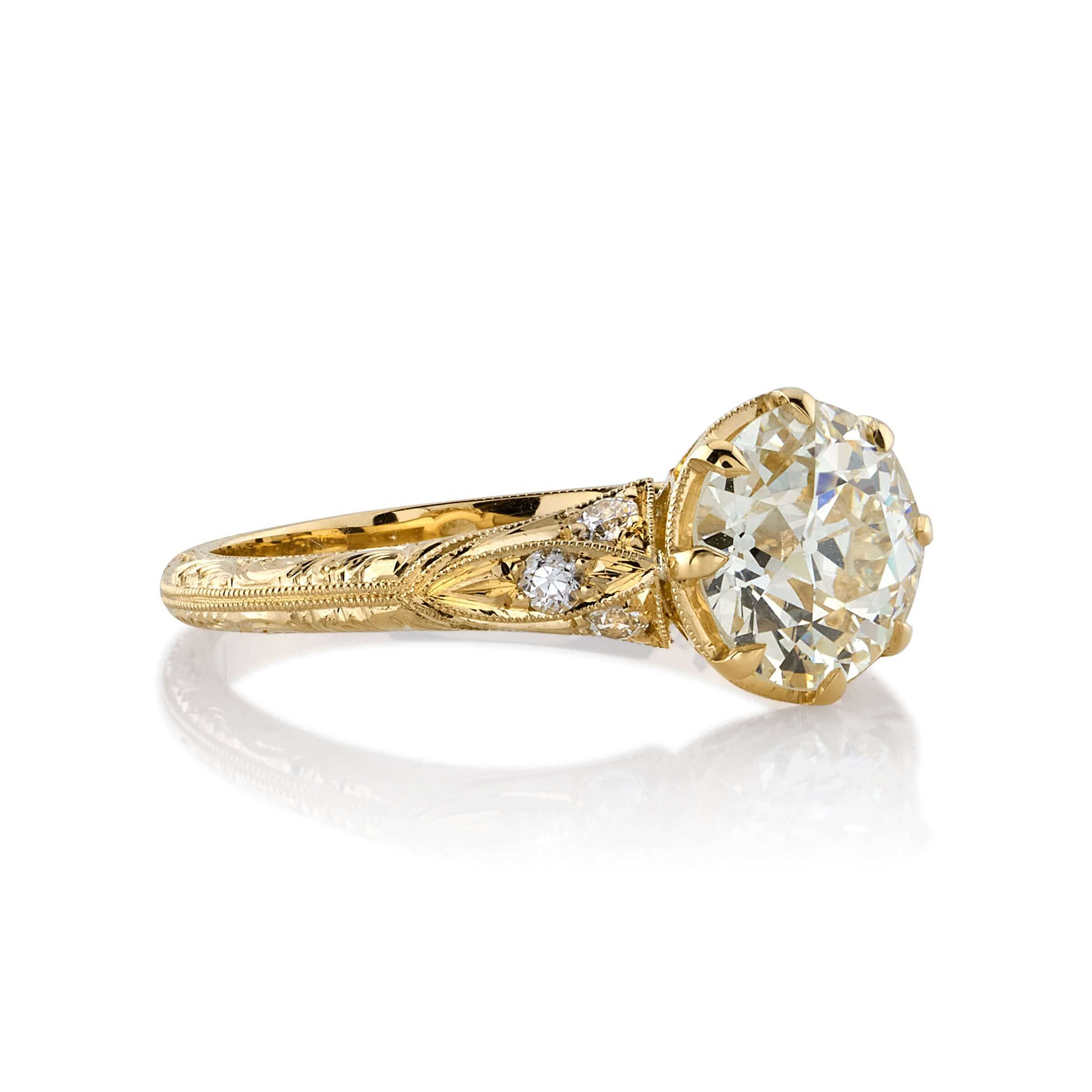 SINGLE STONE NICOLE RING featuring 1.53ct M/VS1 GIA certified old European cut diamond with 0.11ctw old European cut accent diamonds set in a handcrafted 18K yellow gold mounting.