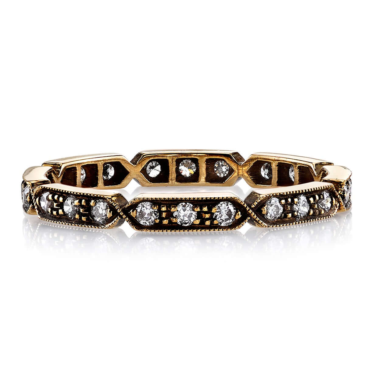 SINGLE STONE CARLY BAND | Approximately 0.30ctw G-H/VS old European cut diamonds prong set in a handcrafted geometric sectional eternity band. Approximate band width 2.1mm. Please inquire for additional customization.