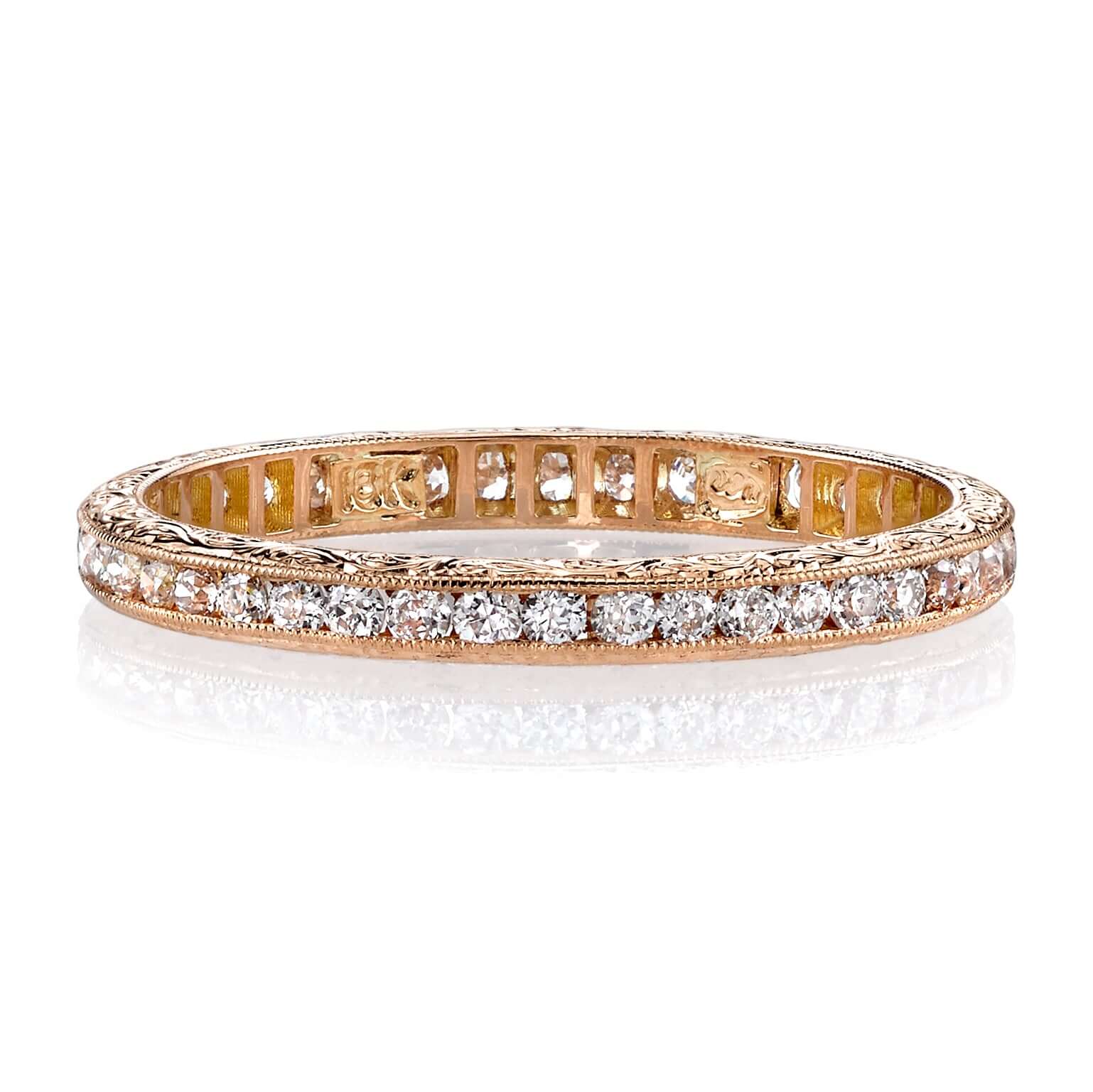 SINGLE STONE MADISON BAND | Approximately 0.40ctw old European cut diamonds channel set in a handcrafted eternity band. Available with polished or engraved sidewalls. Approximate band width 2.1mm.