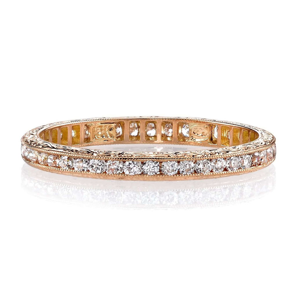 Single Stone's MADISON band  featuring Approximately 0.40ctw old European cut diamonds channel set in a handcrafted eternity band. Available with polished or engraved sidewalls.  Approximate band width 2.1mm.
