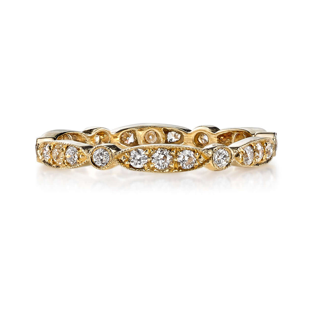 
Single Stone's Sadie band  featuring Approximately 0.50ctw G-H/VS old European cut diamonds set in a handcrafted eternity band. 
Approximate band with 2.5mm. 
Please inquire for additional customization. 
