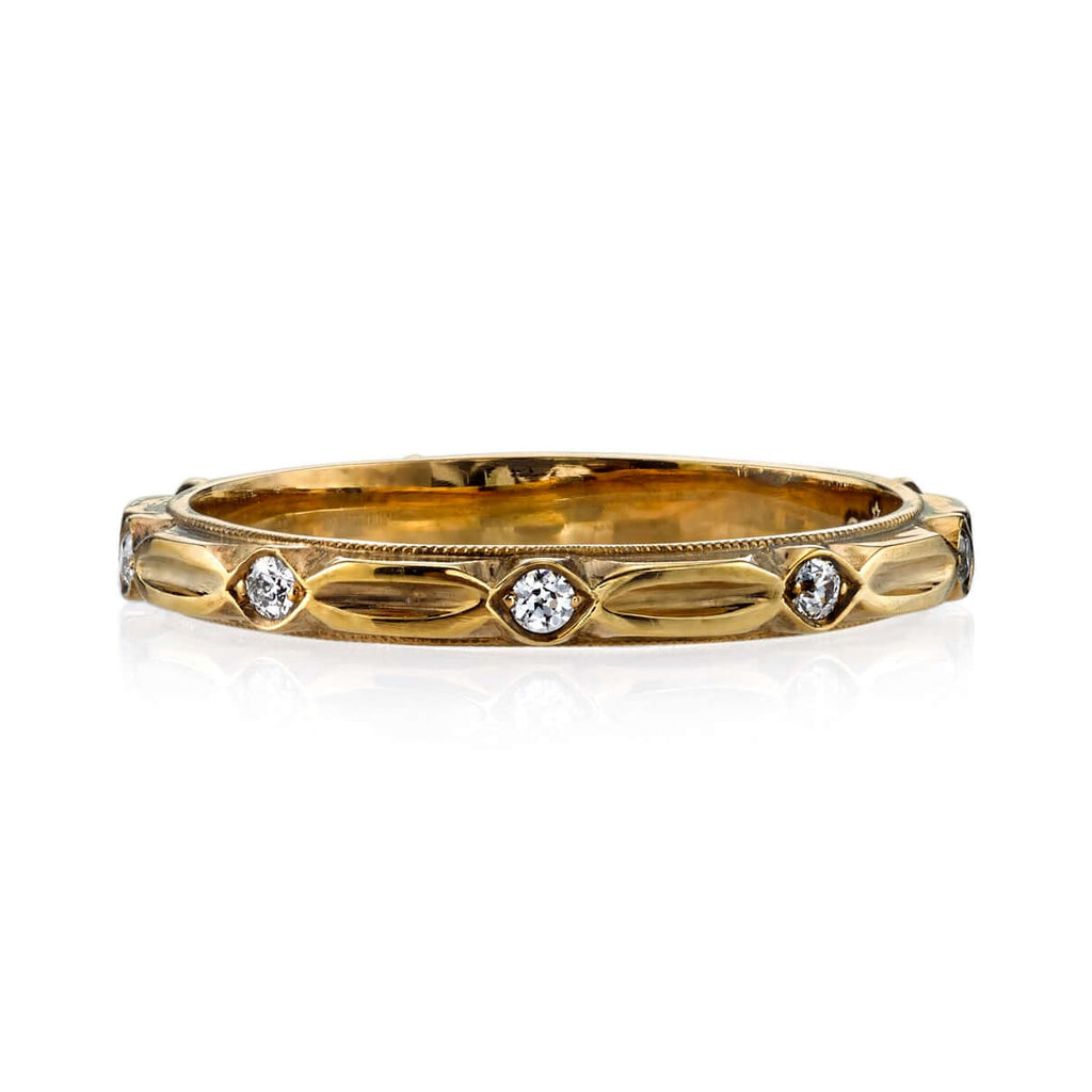 
Single Stone's Kennedy band  featuring Approximately 0.20ctw G-H/VS old European cut diamonds set in a handcrafted, oxidized 18K gold eternity band. 
Approximate band width 2mm.
Please inquire for additional customization.
