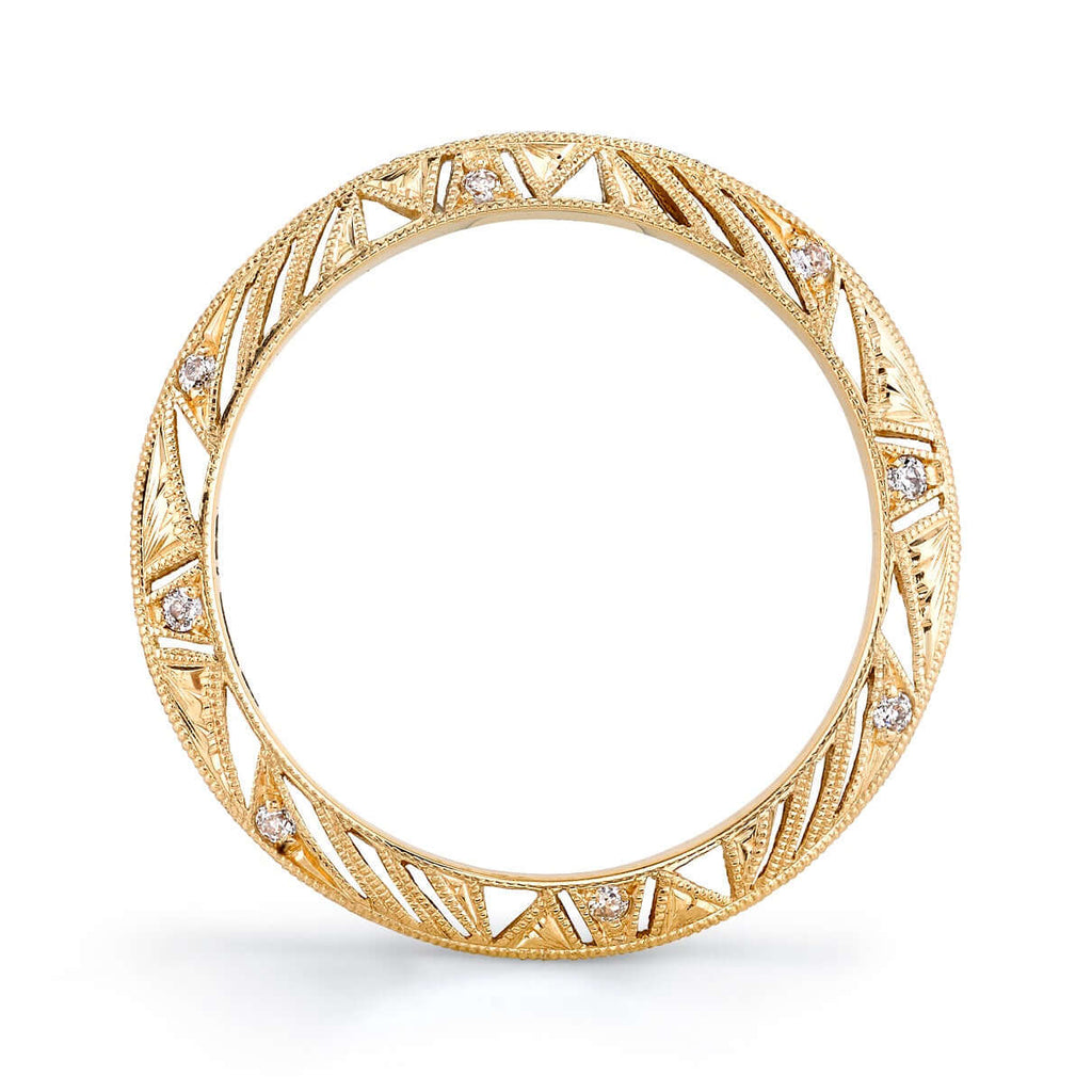 Single Stone's PHOENIX band  featuring Approximately 0.10ctw G-H/VS old European cut diamonds prong set in a handcrafted 18K yellow gold eternity band. Available in an oxidized or polished finish. Approximate band with 2.4mm.  Please inquire for additional customization. 
