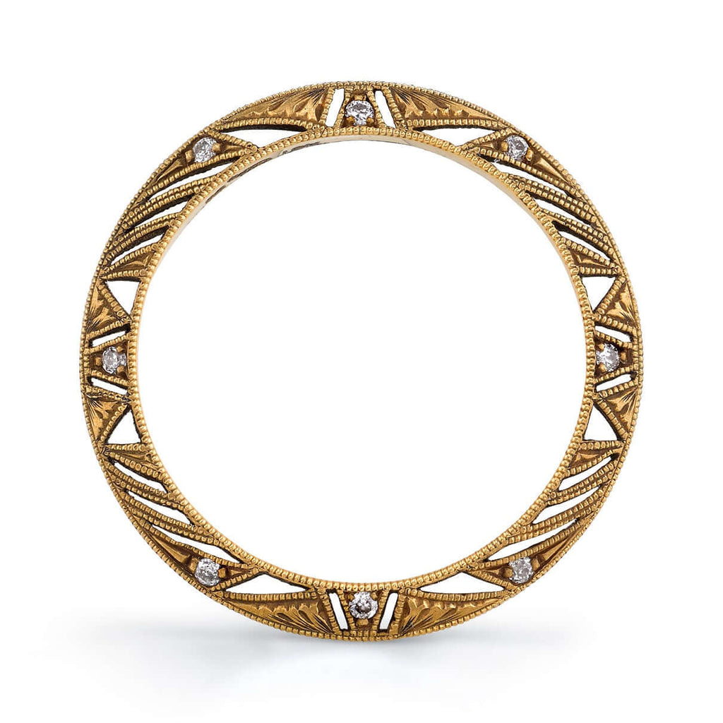 Single Stone's PHOENIX band  featuring Approximately 0.10ctw G-H/VS old European cut diamonds prong set in a handcrafted 18K yellow gold eternity band. Available in an oxidized or polished finish. Approximate band with 2.4mm.  Please inquire for additional customization. 
