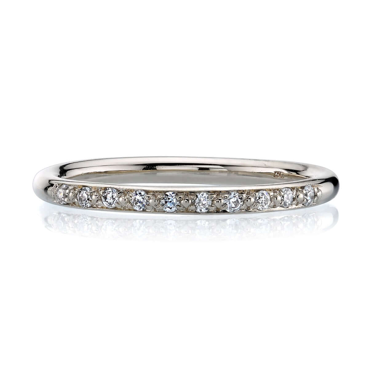 SINGLE STONE JAMIE BAND | Approximately 0.10ctw old European cut diamonds pave set in a handcrafted prong set half eternity band. Approximate band width 2mm. Please inquire for additional customization.