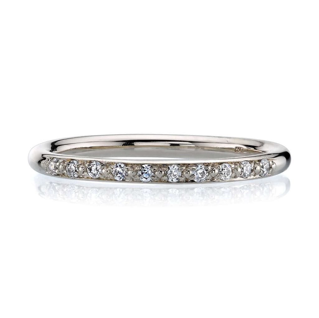 Single Stone's JAMIE band  featuring Approximately 0.10ctw old European cut diamonds pavé set in a handcrafted half eternity band. Approximate band width 2mm. Please inquire for additional customization.
