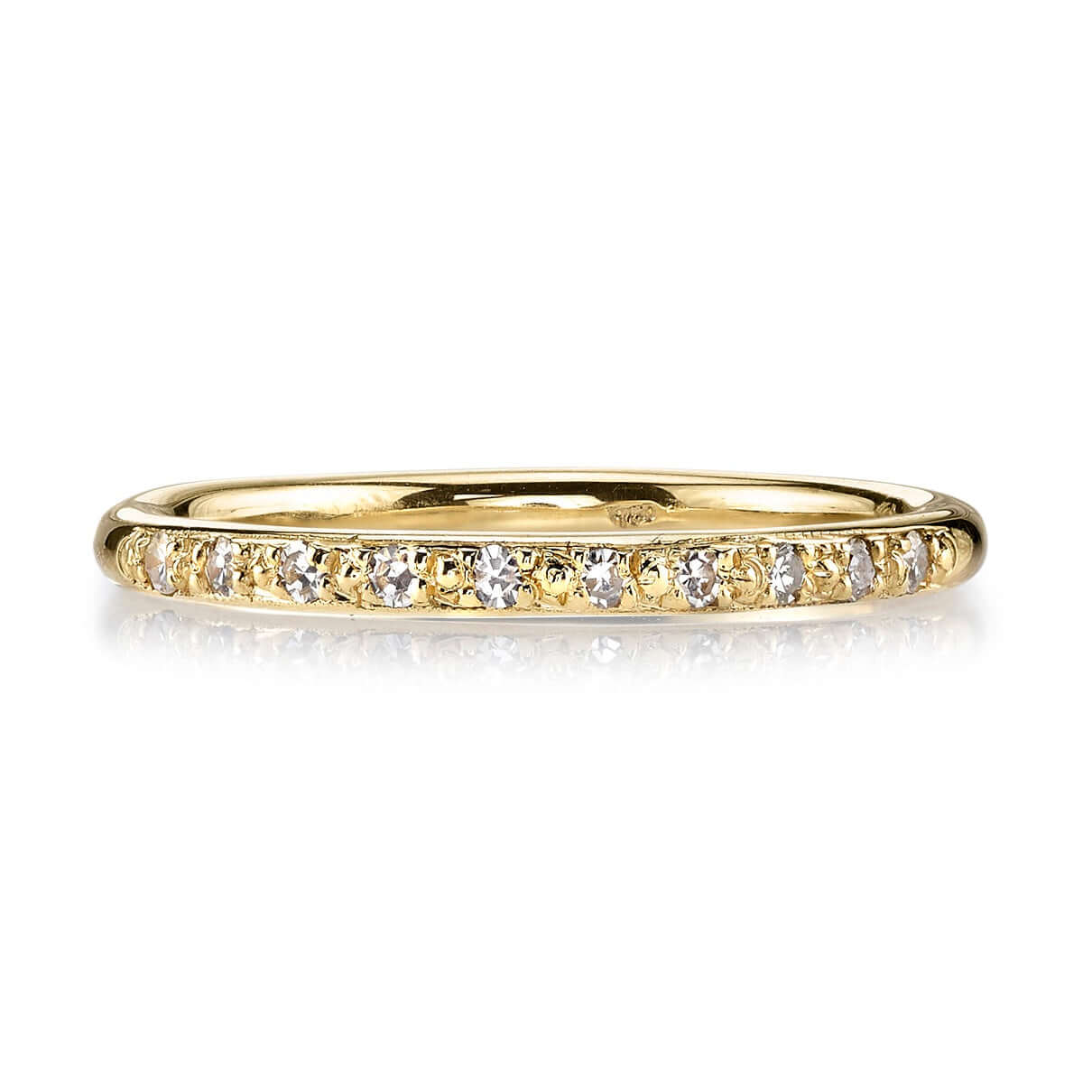 SINGLE STONE JAMIE BAND | Approximately 0.10ctw old European cut diamonds pave set in a handcrafted prong set half eternity band. Approximate band width 2mm. Please inquire for additional customization.