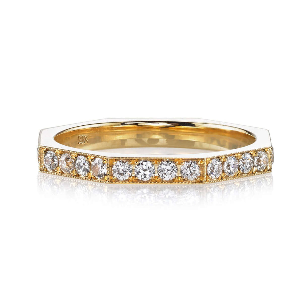 
Single Stone's Reilyn band  featuring Approximately 0.65ctw old European cut diamonds prong set in a handcrafted octagonal sectional band
Approximate band with 2.2mm. 
Please inquire for additional customization. 
