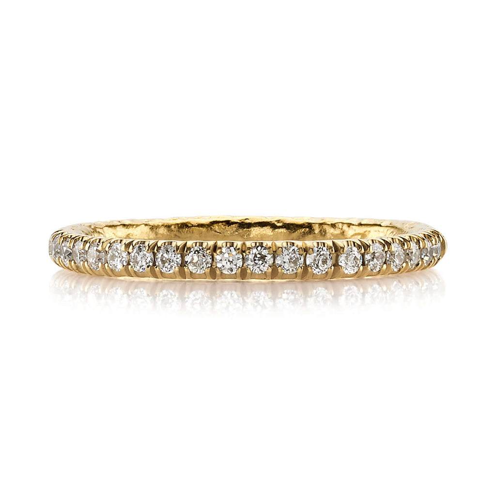 Single Stone's STEVIE band  featuring Approximately 0.24ctw G-H/VS old European cut diamonds pavé set in a handcrafted hammered 22K yellow gold half eternity band. Approximate band with 2mm. Please inquire for additional customization.
