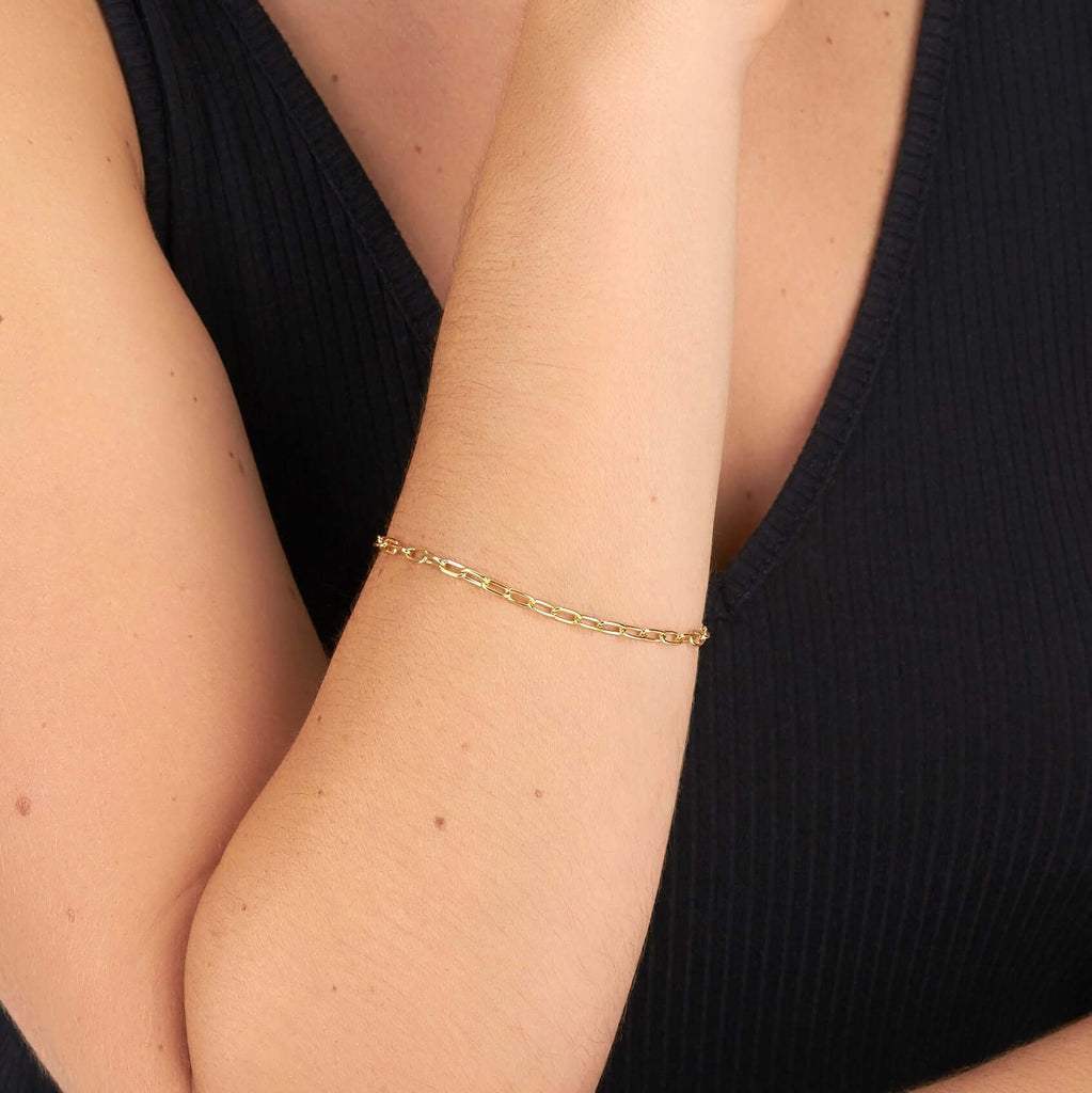 Single Stone's BOND BRACELET  featuring Handcrafted long link 18K yellow gold bracelet. Bracelet measures 7.5&quot;. Please inquire for additional customization. 
