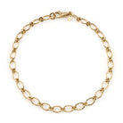SINGLE STONE CREW NECKLACE featuring Handcrafted 18K yellow gold oval and round link necklace. Charms sold separately.