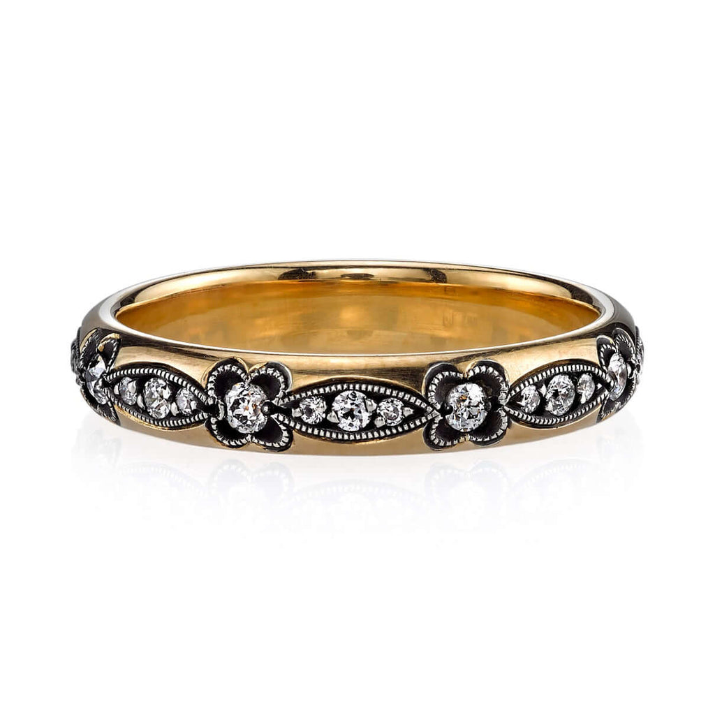 
Single Stone's Makayla band  featuring Approximately 0.30ctw G-H/VS old European cut diamonds set in a handcrafted, oxidized 18K yellow gold and silver eternity band.
Approximate band width 3.4mm.
Please inquire for additional customization. 
