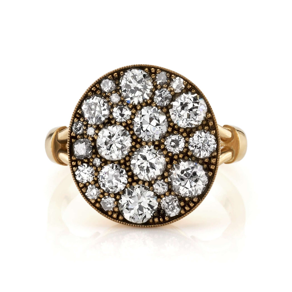 Single Stone's COBBLESTONE CRUX ring  featuring 2.42ctw varying old cut and round brilliant cut diamonds set in a handcrafted, oxidized 18K yellow gold mounting. Price may vary according to total diamond weight. *Cobblestone pattern may vary from piece to piece
