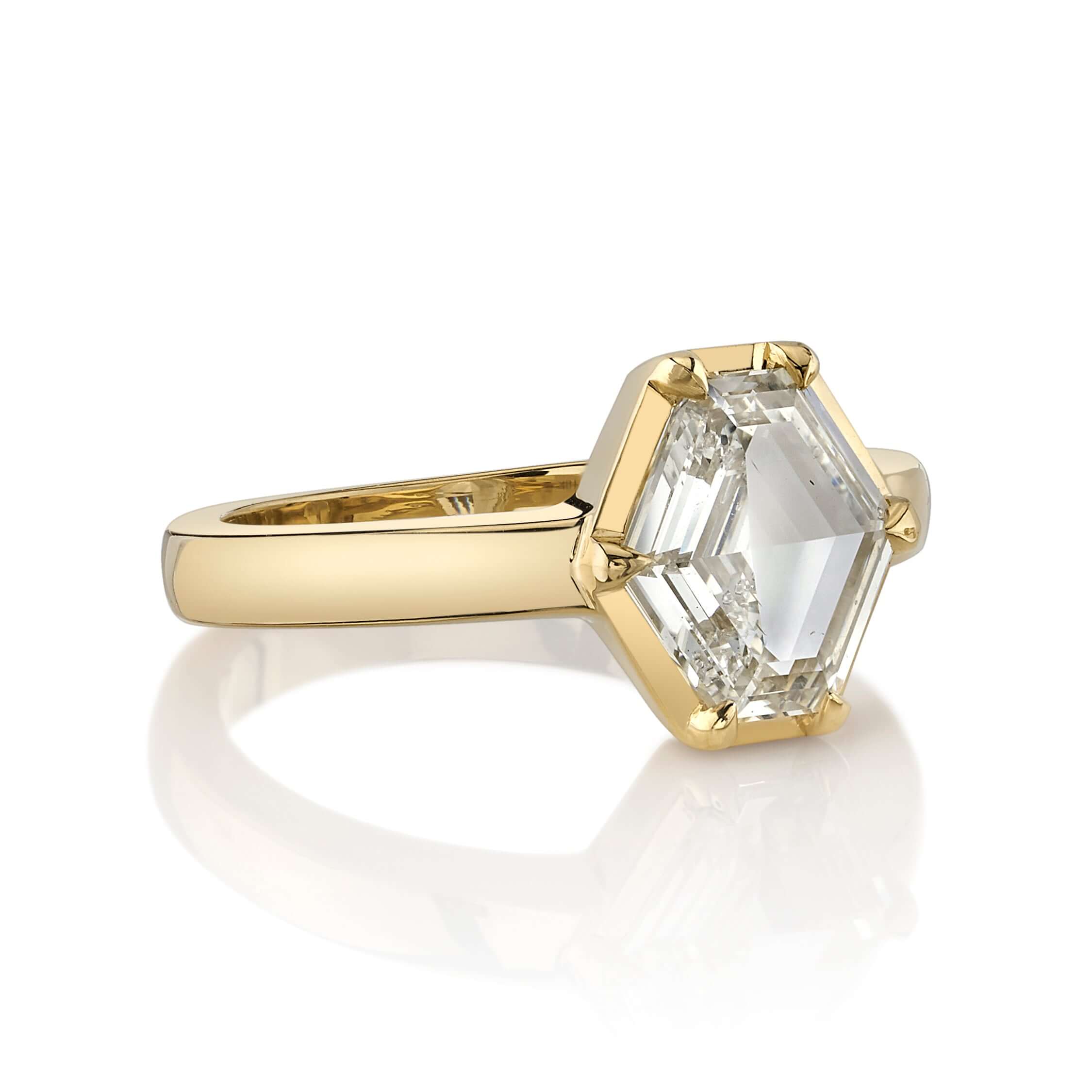 SINGLE STONE ODETTE RING featuring 1.66ct O-P/SI2 GIA certified hexagonal cut diamond set in a handcrafted 18K yellow gold mounting.