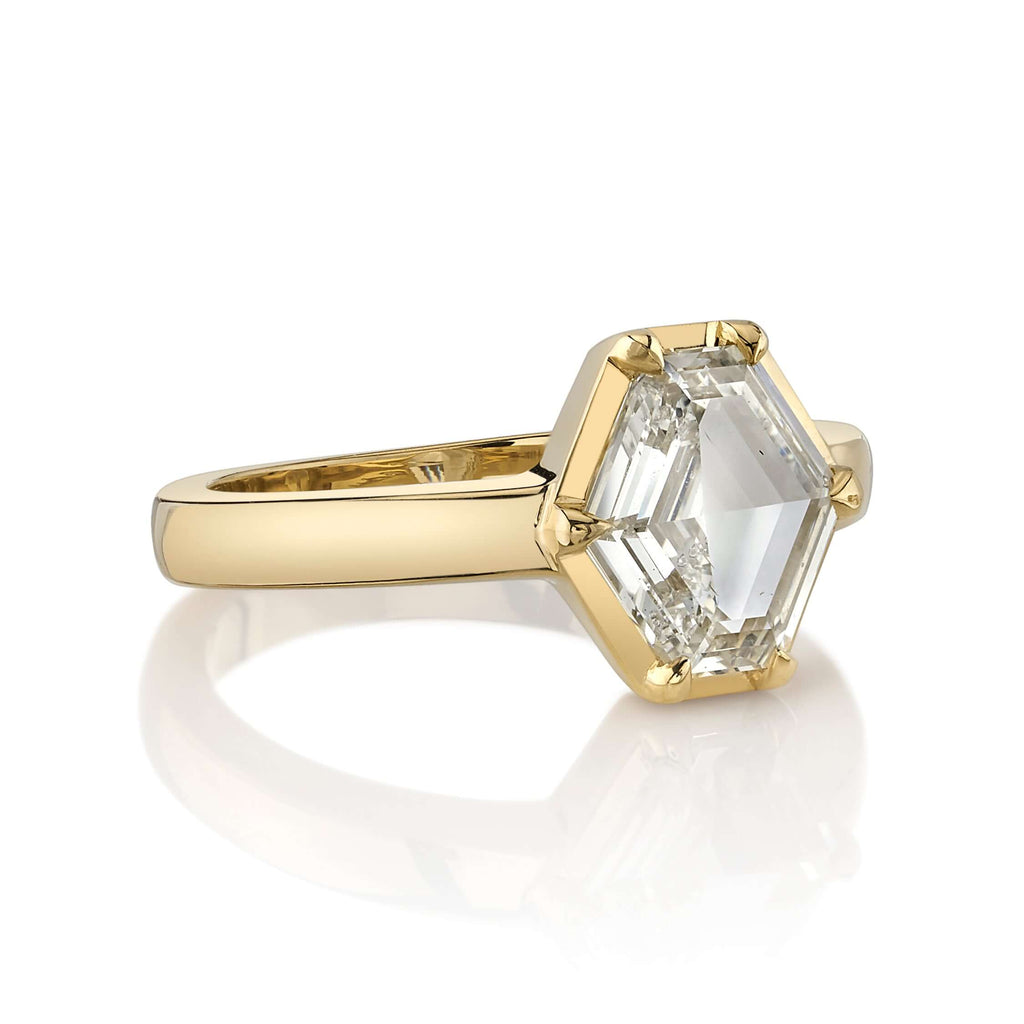 Single Stone's ODETTE ring  featuring 1.66ct O-P/SI2 GIA certified hexagonal cut diamond set in a handcrafted 18K yellow gold mounting.
