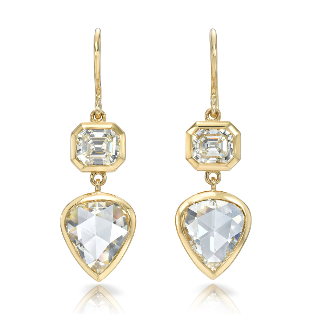 
Single Stone's Paloma double drops earrings  featuring 6.21ctw GIA certified M/VS1-SI2 pear shaped rose cut diamonds with 2.26ctw L/VVS1-VVS2 Asscher cut diamonds bezel set in handcrafted 18K yellow gold drop earrings.
