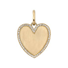 SINGLE STONE MINNIE WITH PAVE PENDANT featuring Approximately 0.25ctw old European cut diamonds surrounding a handcrafted 18K yellow gold heart shaped charm. Price does not include chain. Charm measures 21mm x 24mm.