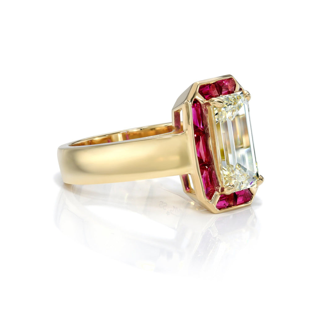 Single Stone's PIPPA ring  featuring 2.52ct M/VS2 GIA certified emerald cut diamond with 1.09ctw French cut rubies set in a handcrafted 18K yellow gold mounting.
