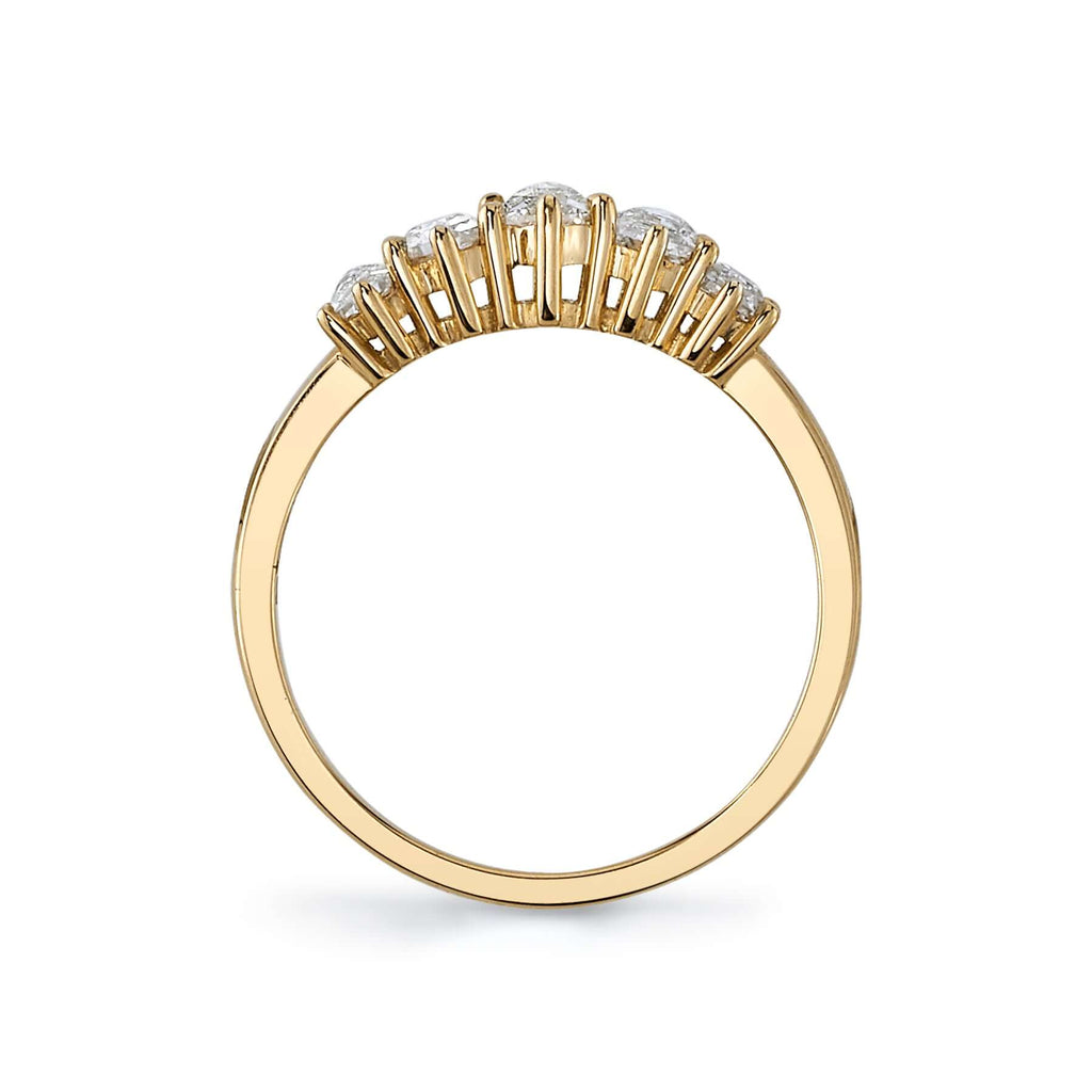 Single Stone's QUINCY ring  featuring 0.55ctw hexagonal shaped rose cut diamonds prong set in a handcrafted 18K yellow gold five stone mounting.
