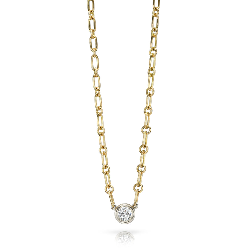 
Single Stone's Randi necklace ring  featuring 0.44ct I/VS2 GIA certified old European cut diamond bezel set on a handcrafted 18K yellow and champagne white gold pendant necklace.
