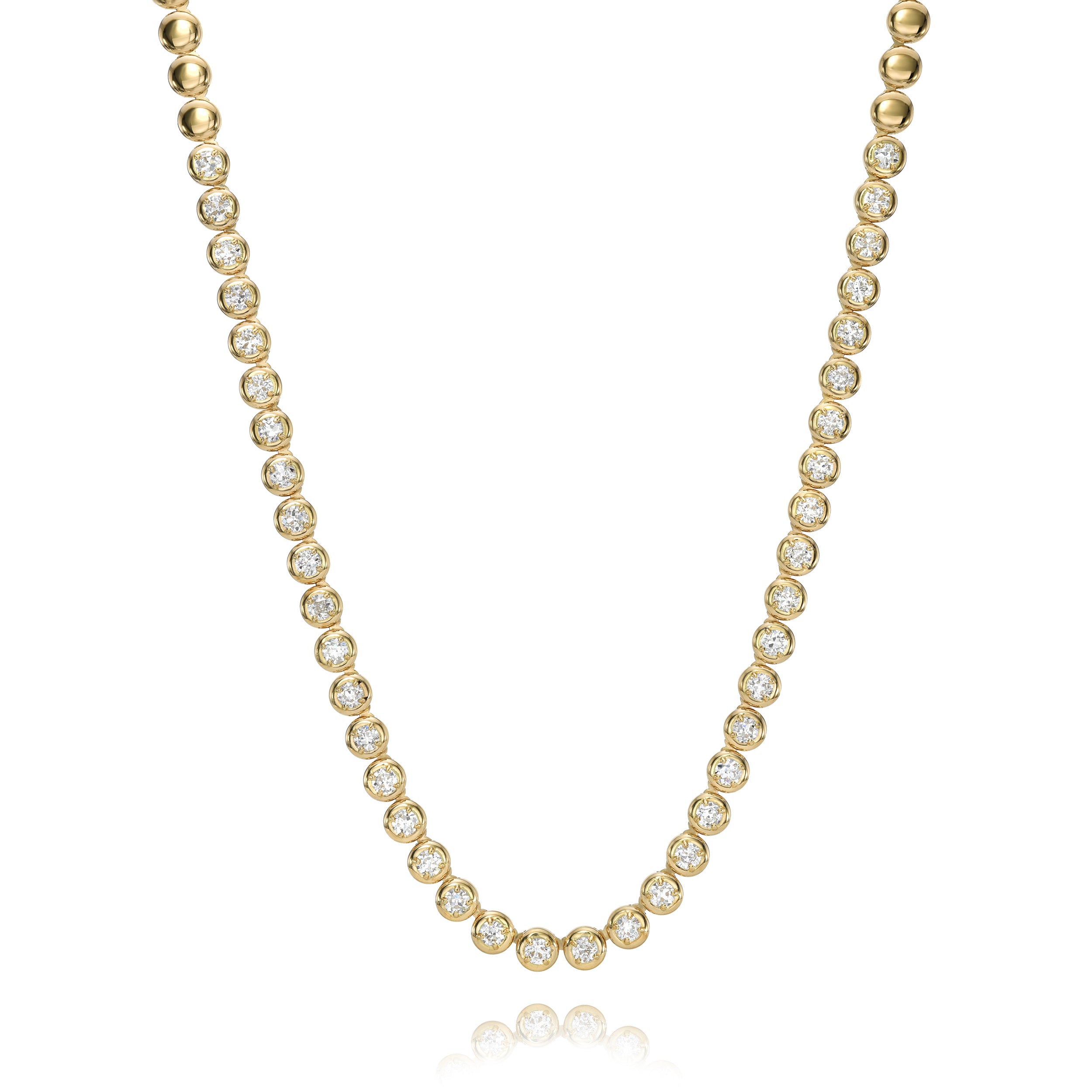 SINGLE STONE RANDI RIVIERA NECKLACE featuring 8.60ctw G-H/VS-SI Old European cut diamonds prong set in a handcrafted 18K yellow gold necklace. Necklace measures 17".