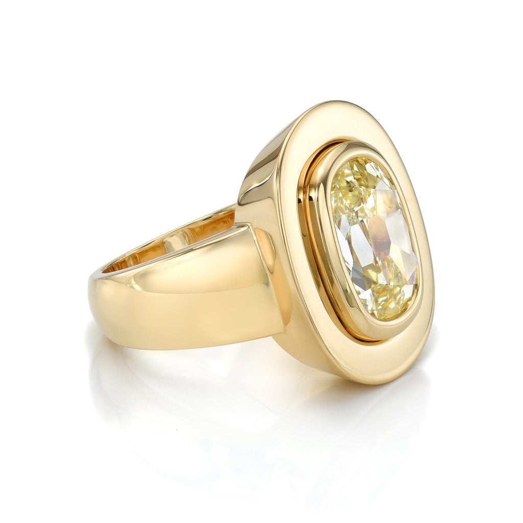 Single Stone's RENA ring  featuring 3.10ct U-V/SI1 GIA certified antique cushion cut diamond bezel set in a handcrafted 18K yellow gold mounting.
