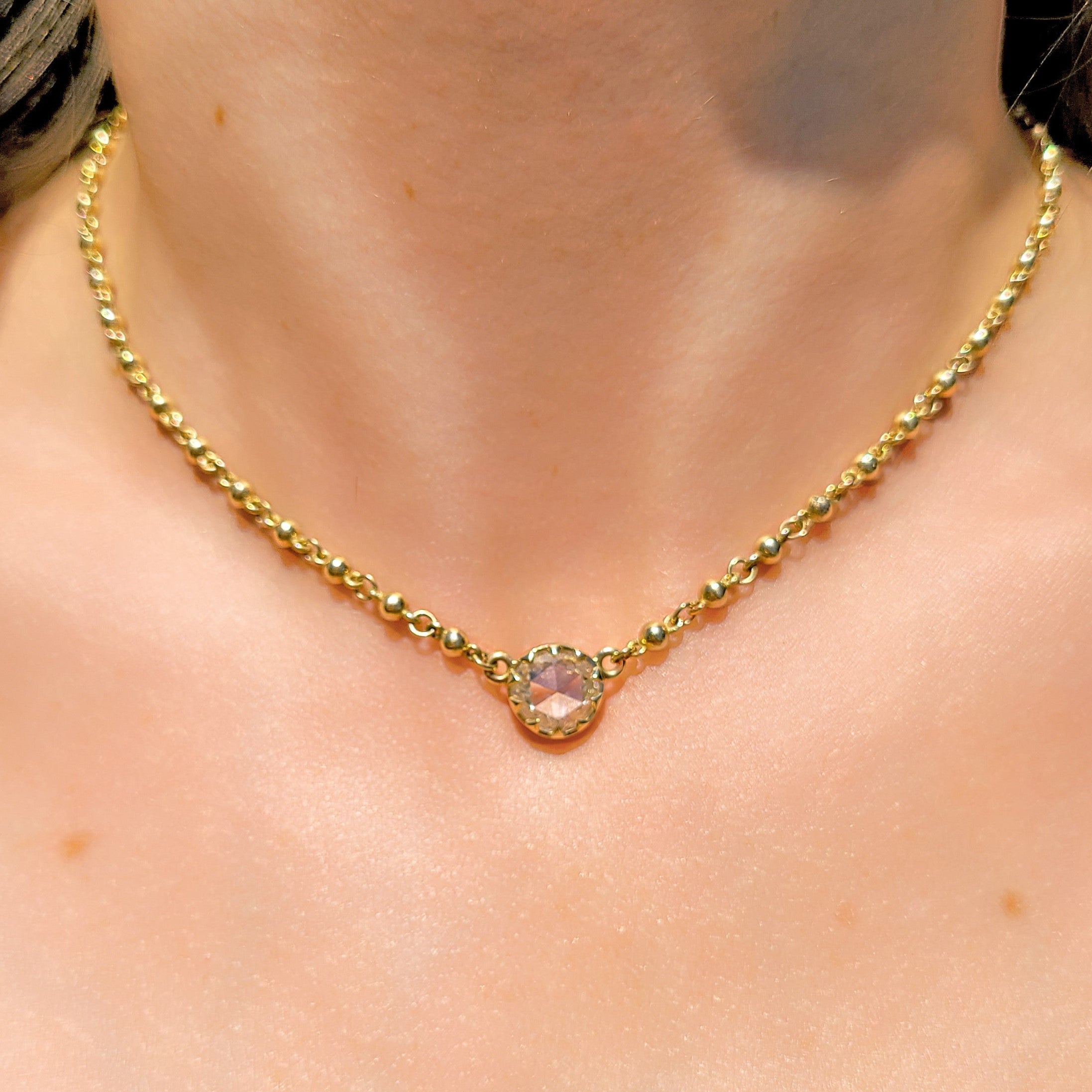 SINGLE STONE ROSALINA NECKLACE featuring 2.00ct L/I2 GIA certified rose cut diamond prong set on a handcrafted 18K yellow gold necklace. This vintage diamond's cut dates back to the 18th century. Necklace measures 17".