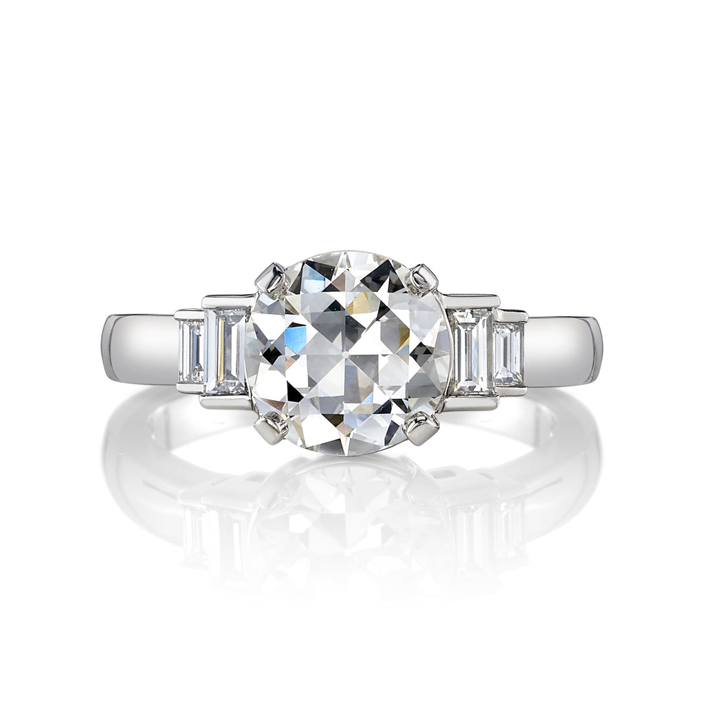 
Single Stone's Scout ring  featuring 2.03ct H/VVS2 GIA certified old European cut diamond with 0.31ctw baguette cut diamond accents set in a handcrafted platinum mounting.
 
