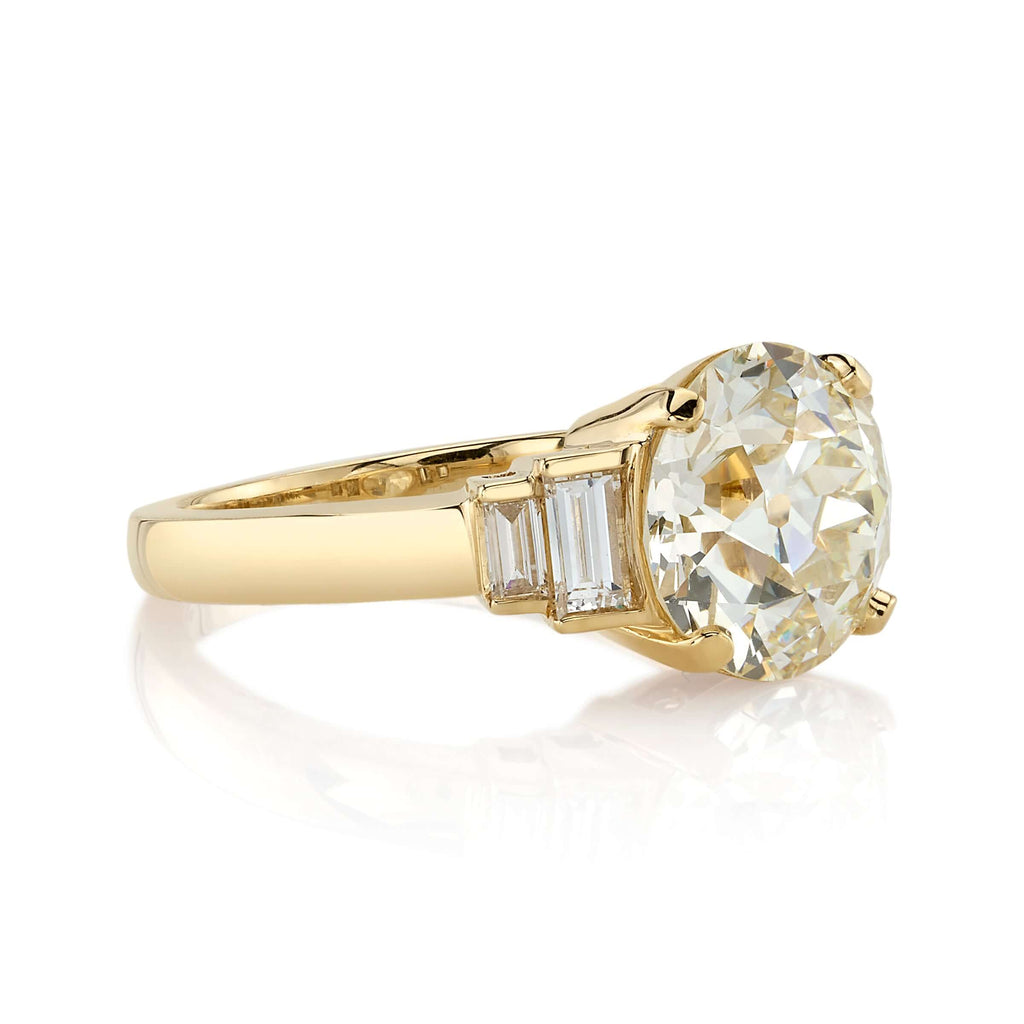 Single Stone's SCOUT ring  featuring 3.47ct L/VS1 GIA certified old European cut diamond with 0.44ctw baguette cut accent diamonds set in a handcrafted 18K yellow gold mounting.
