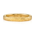 SINGLE STONE FAYE BAND | 2.8mm handcrafted hammered band in 22K yellow gold. Please inquire for additional customization.