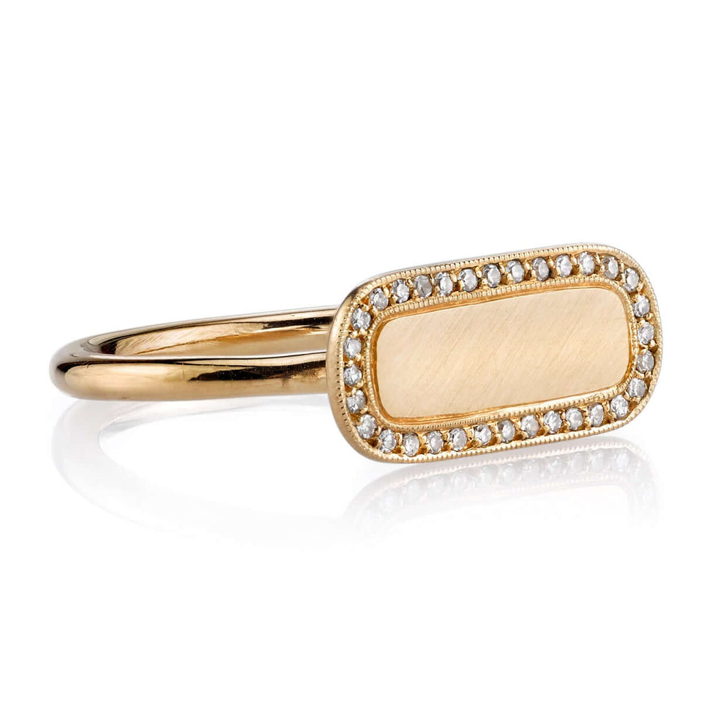 Single Stone's MILO ring  featuring Vintage inspired 18K gold bar ring. A modern take on the classic signet ring. Make it personal! Price includes monogrammed engraving of up to three letters in any of the styles shown above - please be sure to specify before placing your order. Please contact us to inquire about additional customization.
