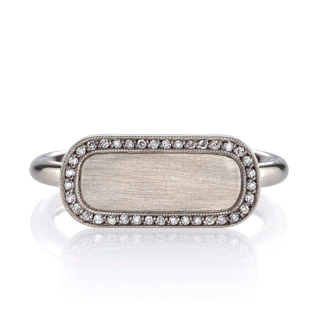Single Stone's MILO ring  featuring Vintage inspired 18K gold bar ring. A modern take on the classic signet ring. Make it personal! Price includes monogrammed engraving of up to three letters in any of the styles shown above - please be sure to specify before placing your order. Please contact us to inquire about additional customization.
