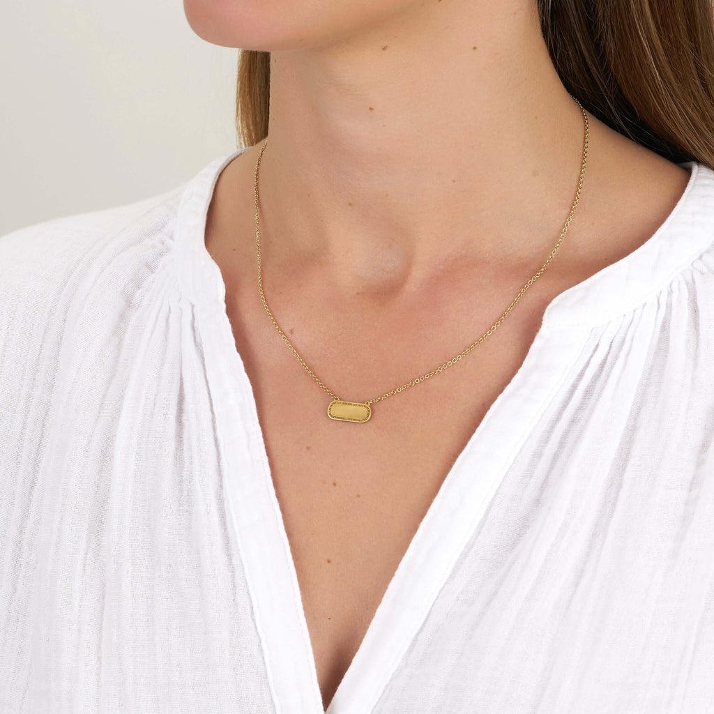 Single Stone's MILO NECKLACE  featuring Vintage inspired yellow gold bar necklace. Necklace measures 17&quot;. Make it personal!  Price includes monogrammed engraving of up to three letters in any of the styles shown above - please be sure to specify before placing your order. Please contact us to inquire about additional customization.
