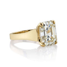 SINGLE STONE SIMONE RING featuring 6.00ct N/VS1 GIA certified rare antique emerald cut diamond prong set in a handcrafted 18K yellow gold mounting.