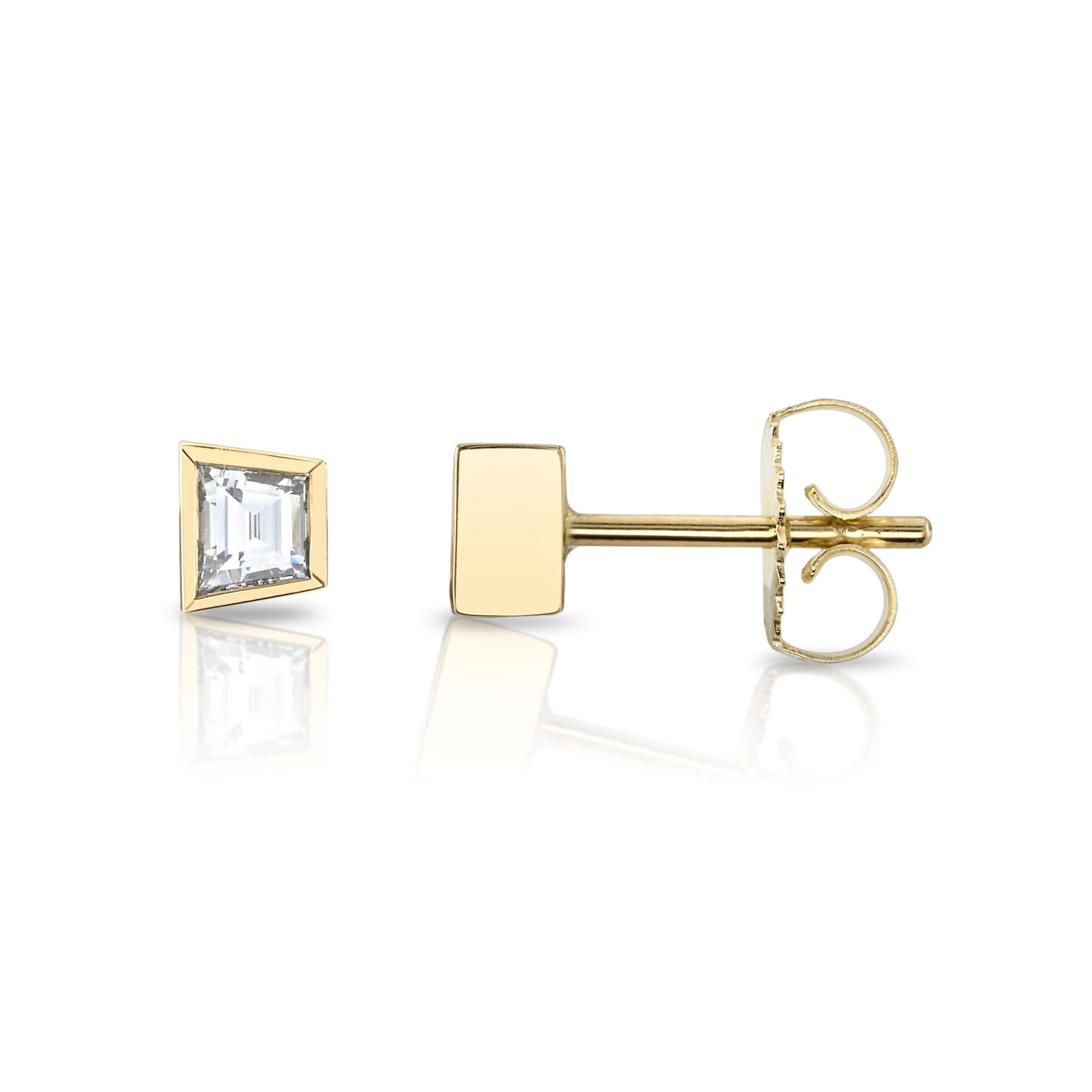 SINGLE STONE SLOANE STUDS | Earrings featuring 0.43ctw G/VS1 trapezoid cut diamonds bezel set in handcrafted 18K yellow gold stud earrings.